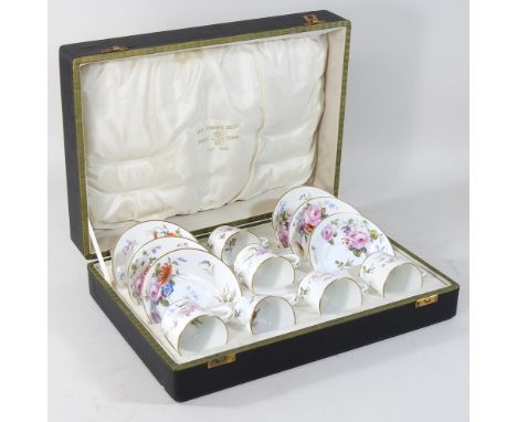 An early 20th century Crown Derby porcelain coffee service, in a fitted case, together with a part tea service and Asiatic Ph