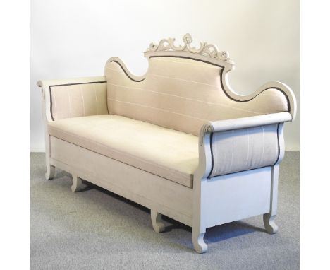 A Victorian style grey painted scroll end sofa, with an upholstered seat, 212cm