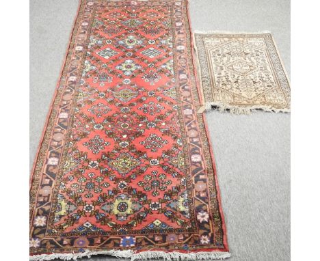 A Hamadan runner, with floral design, on a red ground, 280 x 94cm, together with a prayer rug