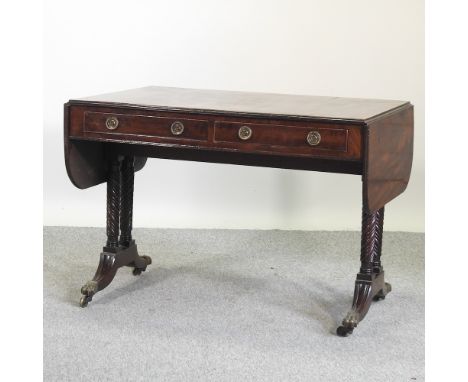 A Regency mahogany sofa table, with a hinged rectangular top, on a splayed base, 160cm long overall