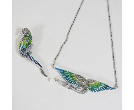 A white metal and enamel brooch, in the form of a parrot, together with a similar necklace (2)