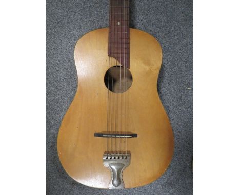 A vintage acoustic guitar 