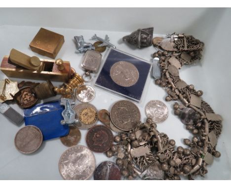 A selection of coins and collectables to include a silver dollar 1883, half dollar 1964, George VI silver crown and a vintage