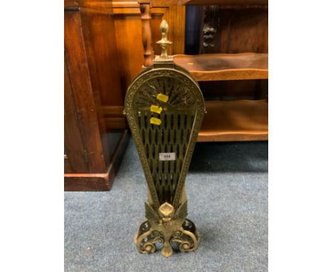 A extending peacock brass firescreen 