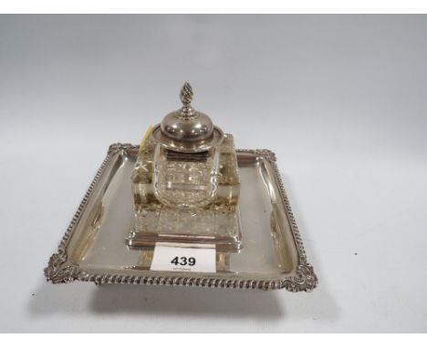 A hallmarked silver inkwell 