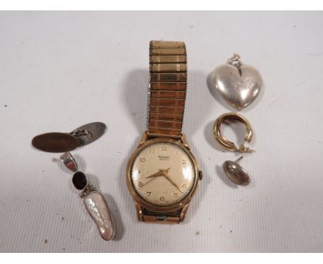 A gents rotary Maximus 9 carat gold wrist watch with presentation inscription on expanding gold plated steel bracelet togethe