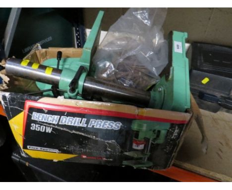 A boxed bench standing pillar drill 