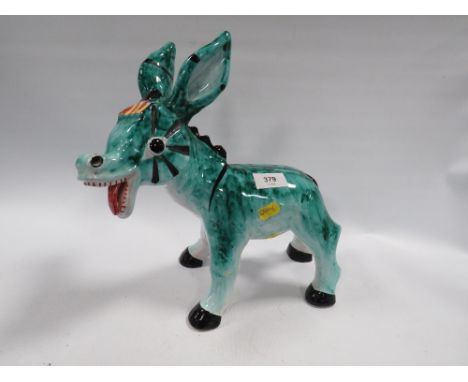 A vintage Italian porcelain donkey figure 