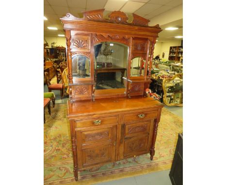 An Edwardian mirrorback chiffonier 