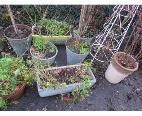 A selection of lightweight garden planters to include an obelisk 