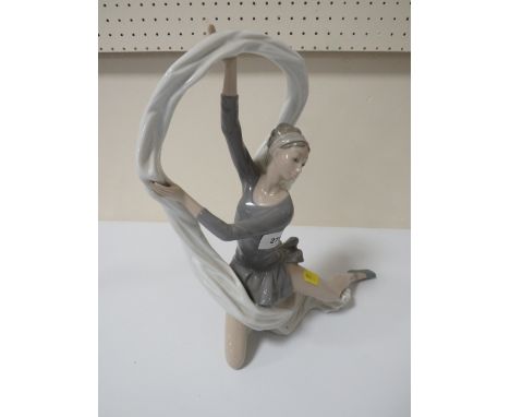 A Nao figure of a ballerina with a scarf 