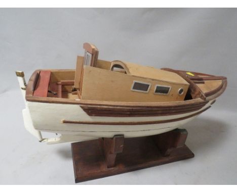 A scratch built motorized model of a trawler boat on display stand together with a vintage wall mounted barometer A/F 