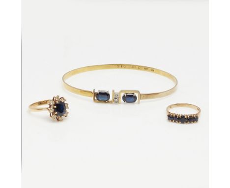 A collection of sapphire jewelleryto include a 9ct gold five stone sapphire ring, an 18ct gold sapphire and diamond cluster r