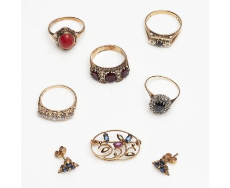 A collection of gem set jewelleryto include a 9ct gold sapphire and diamond set three stone ring, a 9ct gold coral set ring, 