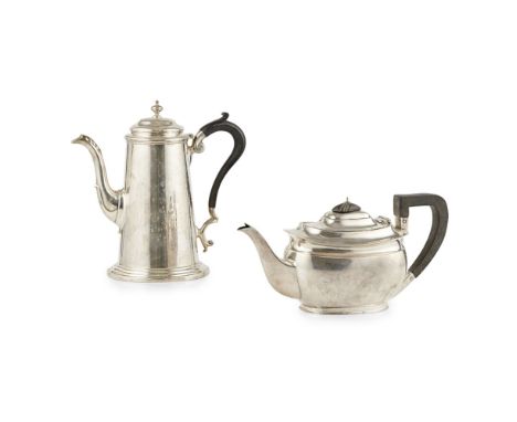 A George III style coffee potMartin Hall and Co. Sheffield 1922, of plain tapered form, domed hinged lid with turned finial, 