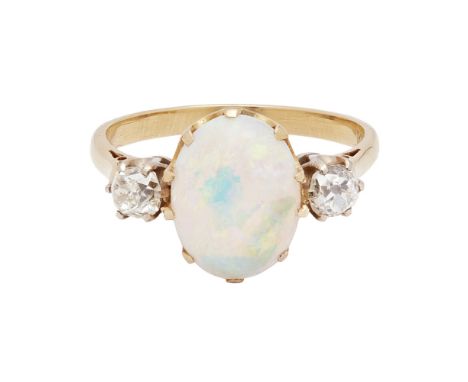 An opal and diamond set ringclaw set with an oval opal, flanked by two old cushion-cut diamonds, to a plain yellow metal shan