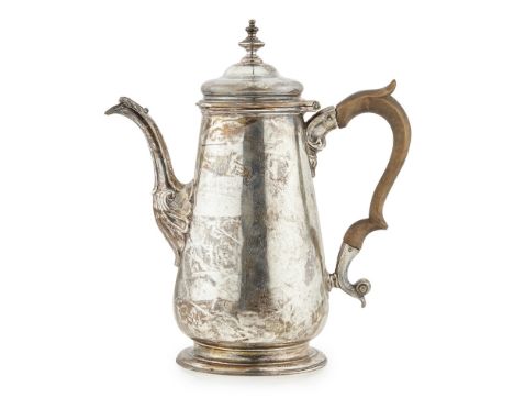 A George II silver coffee-potHenry Brind, London, 1742, tapering on circular moulded foot, the spout terminating at the body 