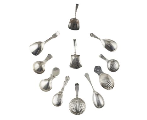 A collection of eleven various caddy spoonsto include; three various modern examples; a George III example with decorated she
