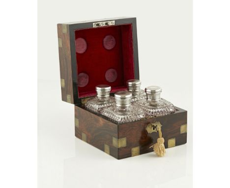 A brass bound rosewood cased set of cut crystal small bottlesthe silver screw-off covers decorated with engine turning, unmar