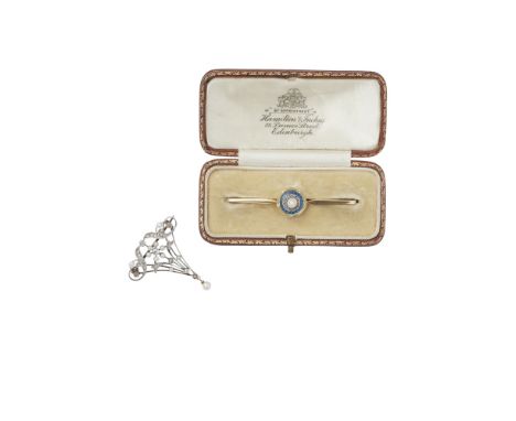 Two early 20th century broochesthe first of pierced tapered scrolling design, set throughout with small seed pearls, millegra