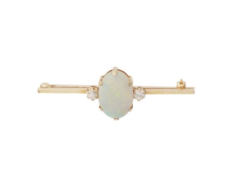 An opal and diamond set broochclaw set with an oval opal, flanked to either side by an old round-cut diamond, to a plain bar 