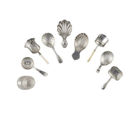 A collection of ten caddy spoons to include;a modern copy of a Jockey hat caddy spoon; two shovel shaped spoons, Samuel Pembe