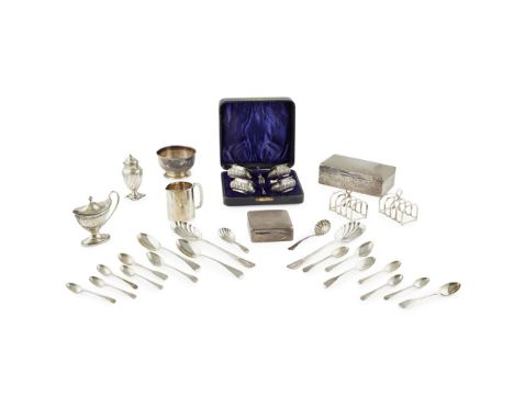 A collection of silverto include; cream jug and sugar bowl; pair of toast racks; two caddy spoons; two cigarette boxes; peppe