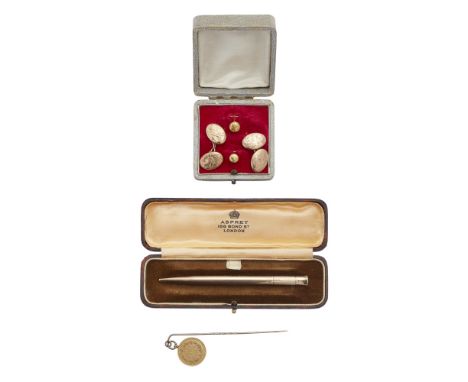 A 9ct gold propelling pencil, Sampson Mordenwith engraved initials; together with a pair of 9ct gold gentleman's cufflinks, a