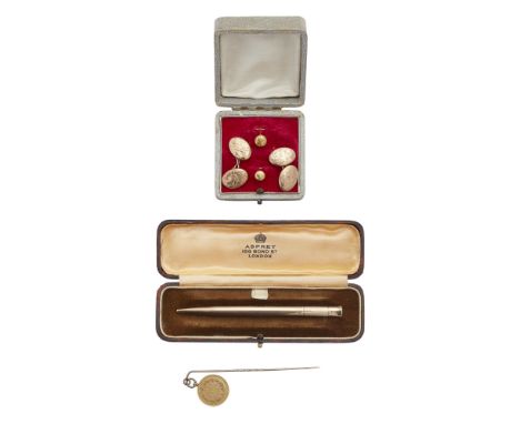 A 9ct gold propelling pencil, Sampson Mordenwith engraved initials; together with a pair of 9ct gold gentleman's cufflinks, a