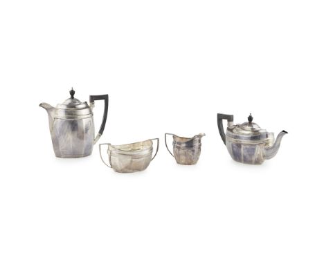 A four piece silver tea serviceBarker brothers, Chester 1911, of panelled form, angular handles, comprising; tea and water po