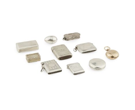 A group of silver snuff, vesta, vinaigrettes and other boxes to includefour various vesta cases, similar engraved decoration,