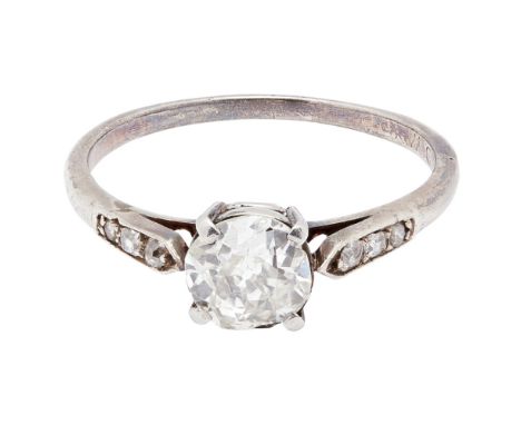 A single stone diamond set ringclaw set with a cushion-cut diamond, the shoulders set with three small graduated round-cut di