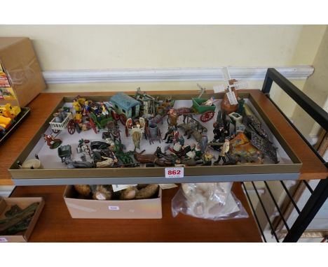 Vintage Lead:&nbsp;a collection of vintage lead items, to include a Charbens gypsy caravan; washing line with clothes; coster