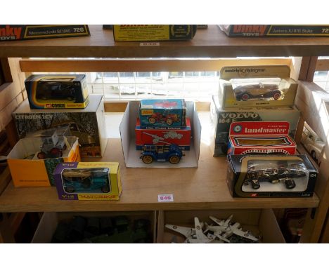 Schuco:&nbsp;a vintage Micro Racer 1036/1 in dismantled box and with original key; together with two boxed Polistil cars: 164