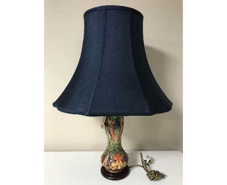 A Moorcroft Flames of the Forest table lamp with shade, lamp base 31cm