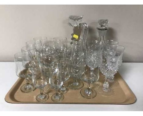 A tray of assorted drinking glasses, claret jug and a decanter, preserve pots, rose bowls etc 