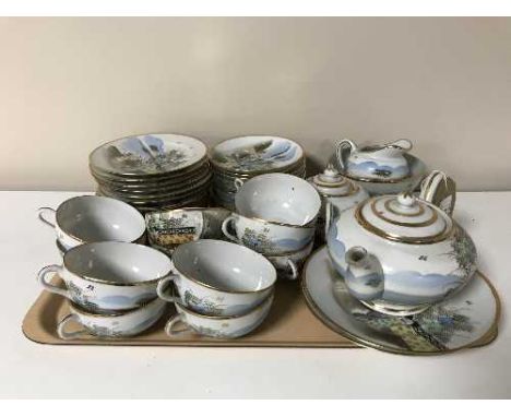 A Japanese egg shell tea service 