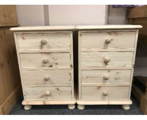 A pair of pine four drawer light pine chests