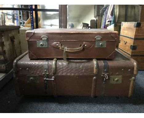 A vintage wooden bound cabin trunk named to Miss E. Brown of 1398 Walker Road, Newcastle On Tyne, together with a leather lug