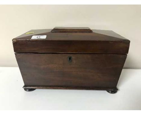 A Victorian mahogany sarcophagus tea caddy 
