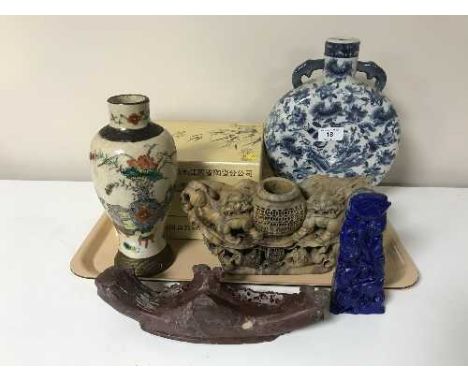 Oriental wares to include a soapstone figure, Chinese carved lapis lazuli ornament, three boxed Chinese collector's plates, a