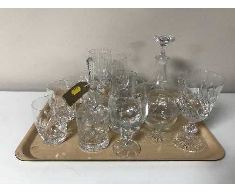 A tray of Dartington crystal decanter, glasses, goblets, bell etc 