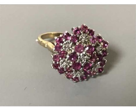 A 9ct gold ruby and diamond cluster ring, size Q/R