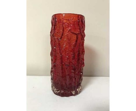 A Whitefriars ruby red cylindrical bark vase, height 23 cm deigned by Jeffrey Baxter 