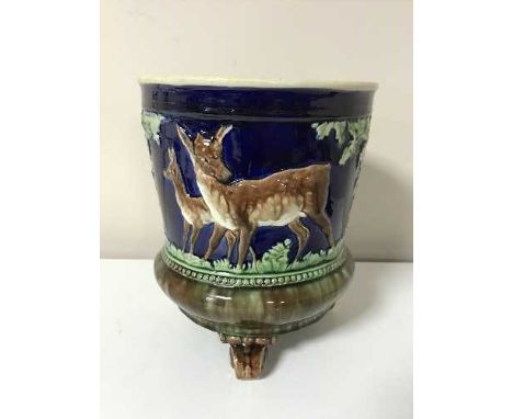 A Majolica style planter decorated with deer