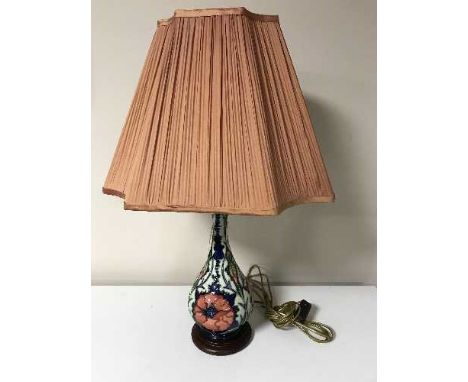 A Moorcroft Poppy table lamp with shade, lamp base 33cm