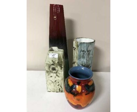 A Poole volcano pattern vase, a similar vase and two pieces of Carn Cornish pottery 