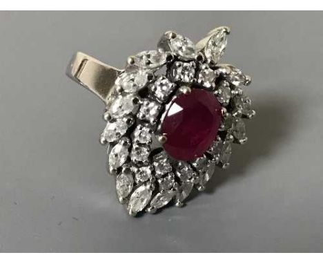 An 18ct white gold ruby and diamond ring, size M/N