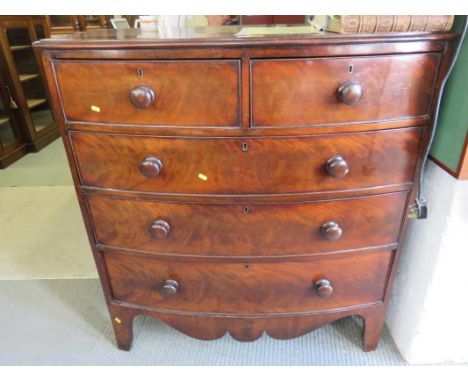 VICTORIAN BOW FRONT CHEST, 2 short and 2 long graduated drawers, wooden knop handles and splayed bracket feet, 42" width