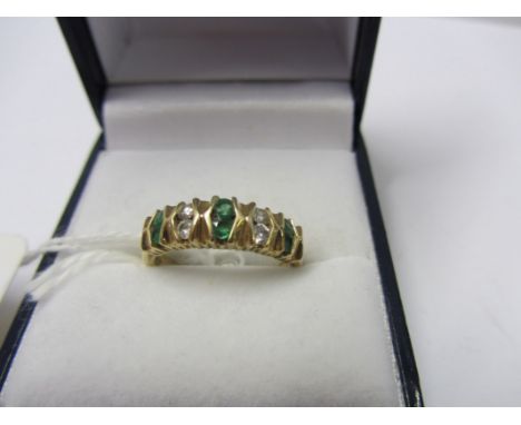 EMERALD & DIAMOND RING in a 14ct yellow gold mount size L